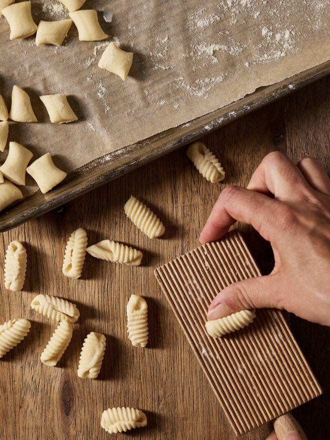 Fresh cavatelli and a ridged board